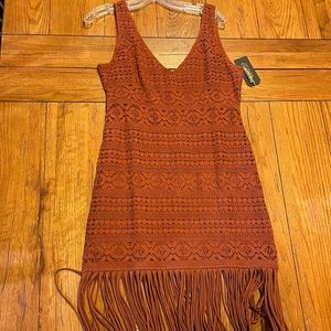 Beautiful western dress. Perfect for fall with the burnt orange and fringe